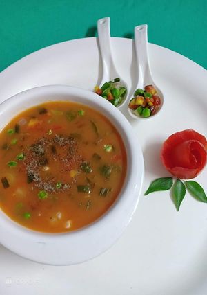 A picture of Mix vegetables tomato soup.