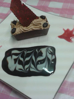 Una foto de Barquitos de chocolate rellenos de crema de café bombón