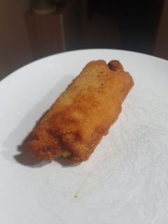 Una foto de Flamenquines de lomo de cerdo rellenos de queso, jamón y paté