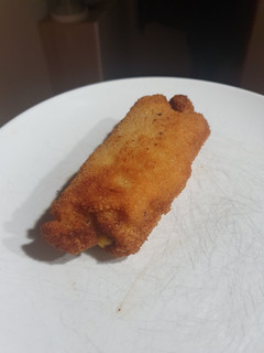 Una foto de Flamenquines de lomo de cerdo rellenos de queso, jamón y paté