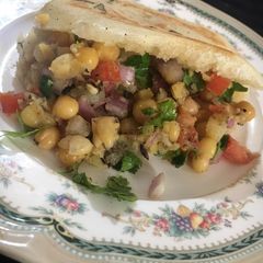 A picture of White-Peas Chaat/Stuffed Kulcha.