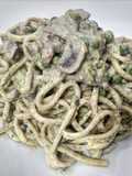 Tagliolini with Truffle, Mushrooms, Peas, and Sausage