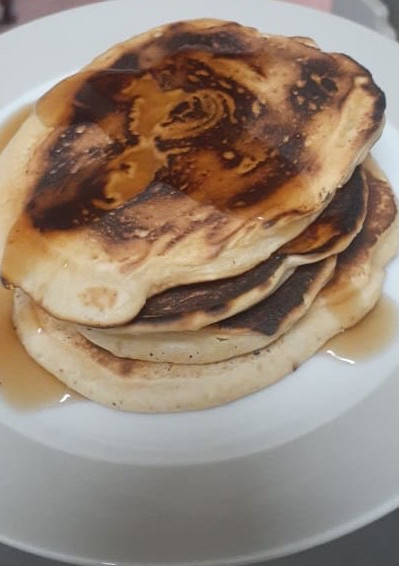 Una foto de Hot Cake con Miel de Mapple