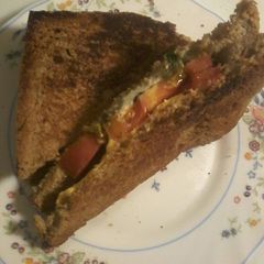 Tomato and basil grilled cheese sandwich A picture of Tomato and basil grilled cheese sandwich.