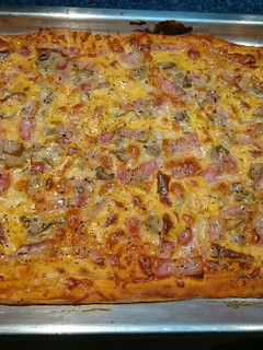 Una foto de Pizza 🍕 de bacon 🍕🍅🔥
