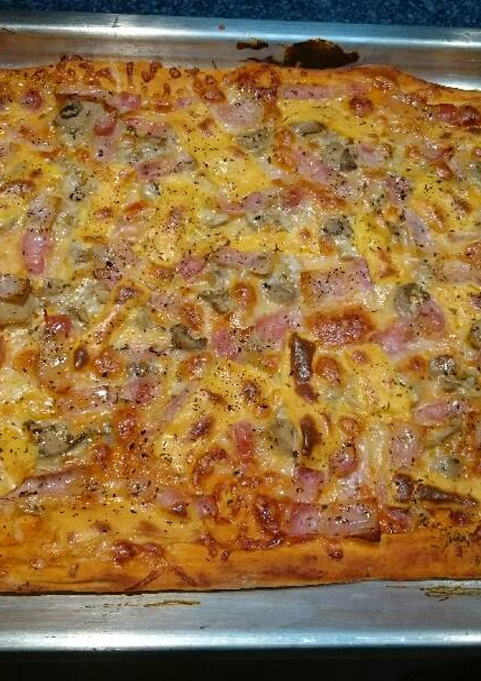 Una foto de Pizza 🍕 de bacon 🍕🍅🔥