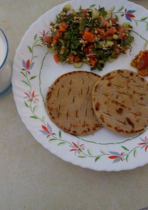 A picture of Mixed sprouts salad and Bhakri.