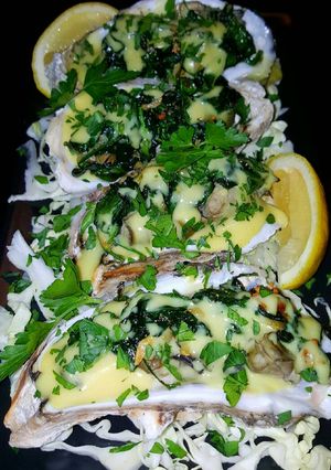 A picture of Mike's Spinach Hollandaise Baked Oysters.