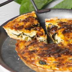 A picture of Mini Guanciale Spinach Quiche.