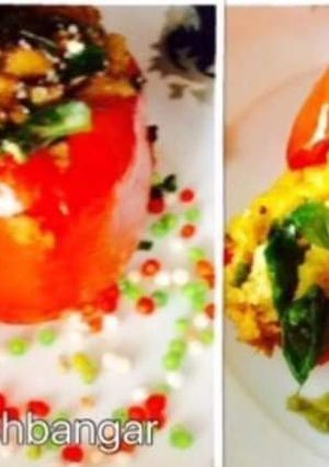 A picture of Dhokla Stuffed Red Capsicum. .