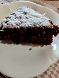 Torta al Cacao Amaro e Cocco Cristallizzato al Miele caramellato e Cocco Grattugiato