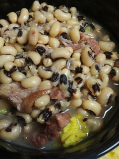 A picture of Ham, with Black Eyed Peas and Yellow Rice.