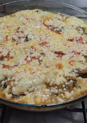 Una foto de Pastel de berenjenas con salsa de repollo al pesto