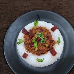 A picture of Beetroot - green peas curry.