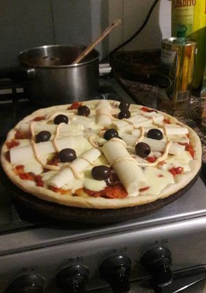 Una foto de Pizza con palmitos