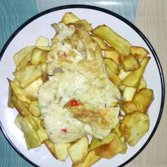 A picture of Fried potato with egg.