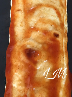Una foto de Rollo de maíz relleno