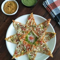 Paneer Pizza Dosa A picture of Paneer Pizza Dosa.