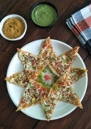 A picture of Paneer Pizza Dosa.