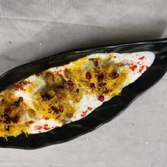 A picture of Dahi vada in Appe pan.