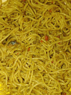 A picture of Fried spaghetti with fish and egg.