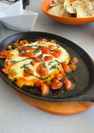 Una foto de Provoleta margarita (parrillera)