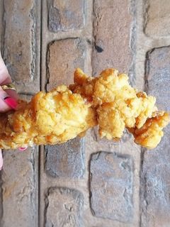 Una foto de Pollo kfc