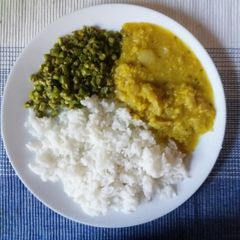 A picture of Cabbage Kootu and long beans curry.