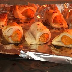 A picture of Pig in a blankets Homemade chicken puffs.