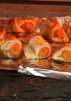 A picture of Pig in a blankets Homemade chicken puffs.