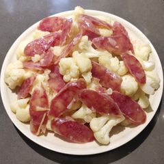 A picture of Sautéed Cauliflower with Chinese Sausage.