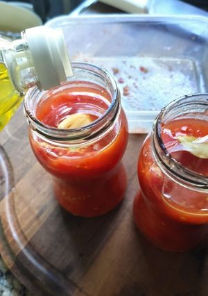 Una foto de Tomates en conserva