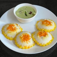 Flower Idli With Coconut 🥥 Chutney A picture of Flower Idli With Coconut 🥥 Chutney.