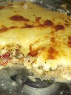 Una foto de Pescado al horno con salsa blanca y muzzarella