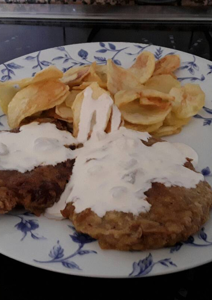 Una foto de Escalopines de ternera con salsa de queso la Peral