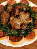 Pollo al nocino e arancia su letto di spinaci