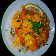 A picture of Mike's Sautéed Garlic Lemon & Saffron Shrimp Over Rice.