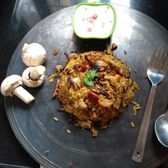 A picture of Smoky mushroom biryani.