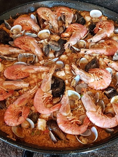 Una foto de Paella