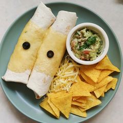 A picture of Mexican chicken enchiladas.