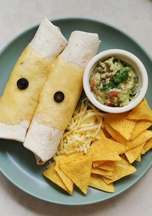 A picture of Mexican chicken enchiladas.