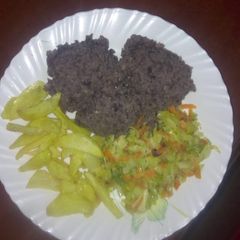 Sweet Smashed njahi and banana with steamed cabbage and fries A picture of Sweet Smashed njahi and banana with steamed cabbage and fries.