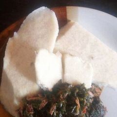A picture of Yam with vegetable sauce.