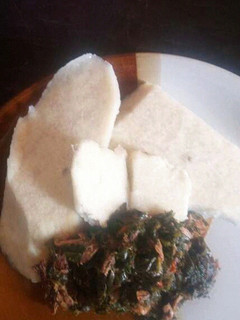 A picture of Yam with vegetable sauce.