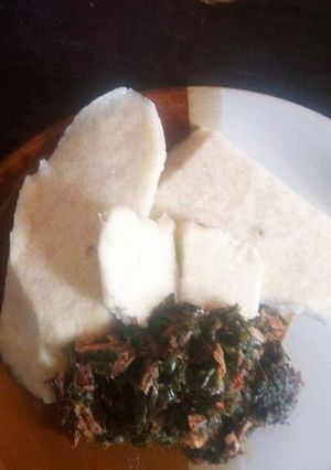 A picture of Yam with vegetable sauce.