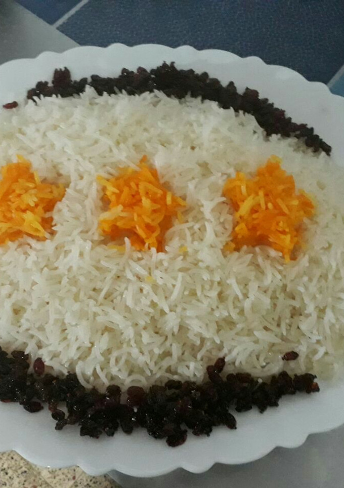 عکسی از دستور تزئین برنج با زرشک و ستاره