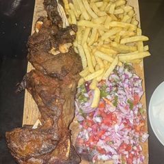 A picture of Chevon maka with fried chips.