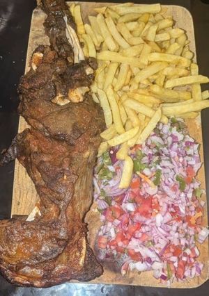A picture of Chevon maka with fried chips.
