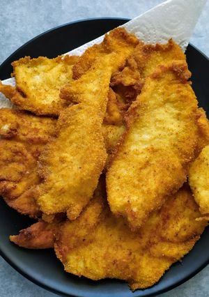 Una foto de Escalopines de pollo. Mi receta 100 chicos...👏👏👏