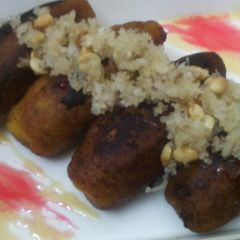A picture of Cheese and peanuts stuffed banana pockets.